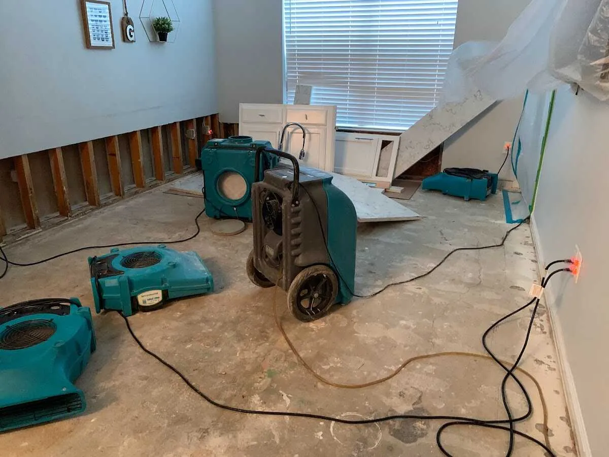 Dehumidifier in flood-cut room for Water Damage Restoration in Waukesha